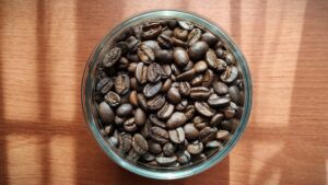 a bowl of Whole coffee Beans 